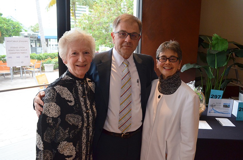 CEO of Millcreek Community Hospital Mary Eckert, Dr. Vincent Fierrodo and LECOM Provost Dr. Silvia Ferretti