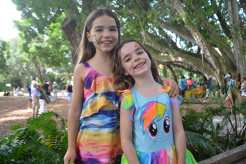 Brooke Shaal poses with her younger sister Rowan Shaal, who opted for a rainbow, unicorn combination.