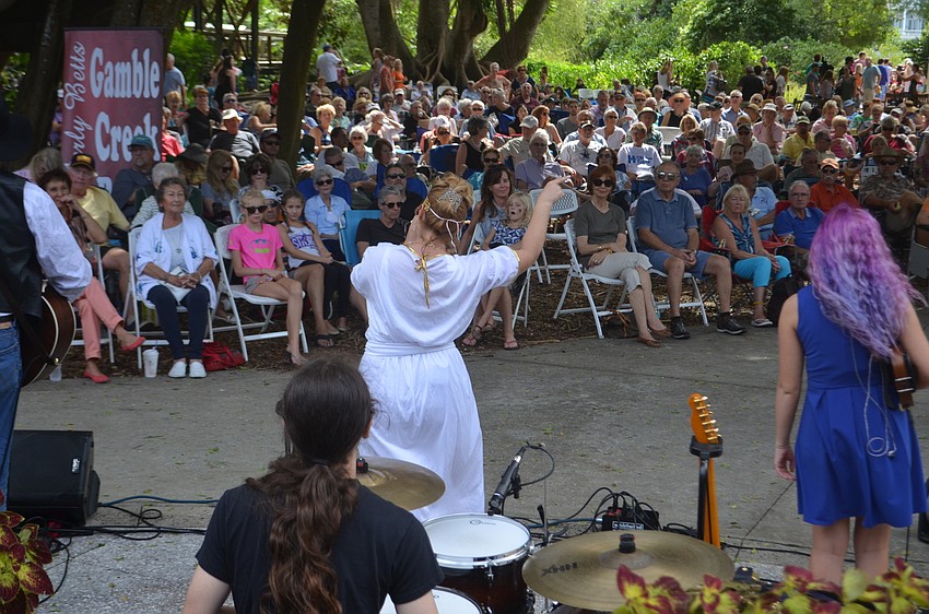 Attendees sat in lawn chairs and on blankets to listen to the Gamble Creek Band.