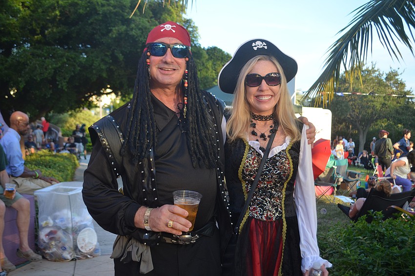 Mark Siegel and Darleen Dahl posed for a photo. The pair wore their pirate costumes to a party the day before, and decided to continue the Halloween spirit. 