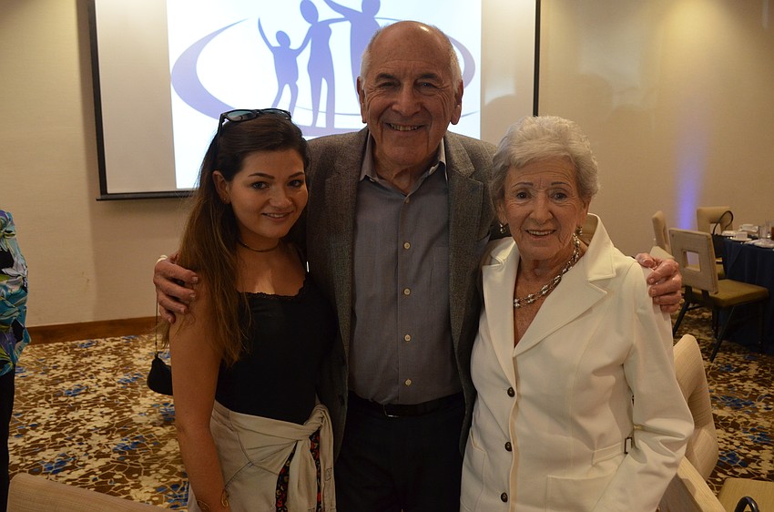Dani Robbins with her grandparents, Joe and Ora Mendels, recipients of the Rabbi Sanford E. & Leah Saperstein Hope and Healing Award
