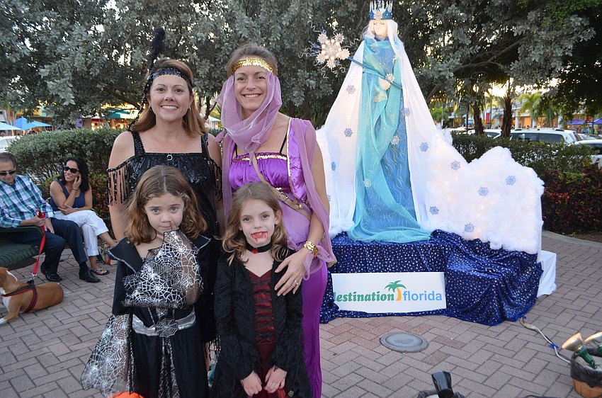 Denise and Morgan Kessler,7, as a flapper and countess with Michele Howell as a genie and Maya Andreu as a vampire.