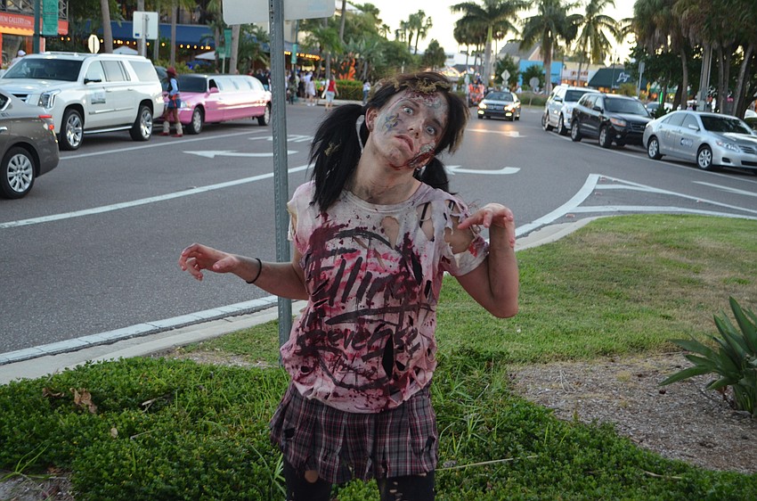Zombies from Sarasota High School’s drama department wandered around St. Armands Circle during Fright Night on Oct. 31.