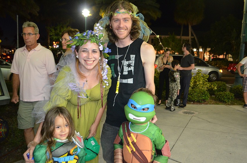 Amelia and Dustin Smith, as modern-day magic users, with Bruce, 3 and Cornelius 4, as Teenage Mutant Ninja Turtles