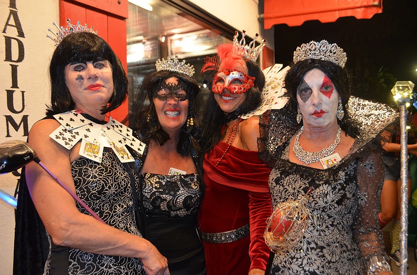 Kathy Bavely, Amy Lidsky, Marcia Gutridge and Debbie Deans as the queens of hearts, spades, clubs and diamonds