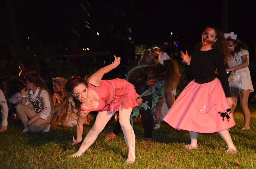 The Sarasota High School drama department performed Michael Jackson’s “Thriller” four times so the crowd could watch from all angles.