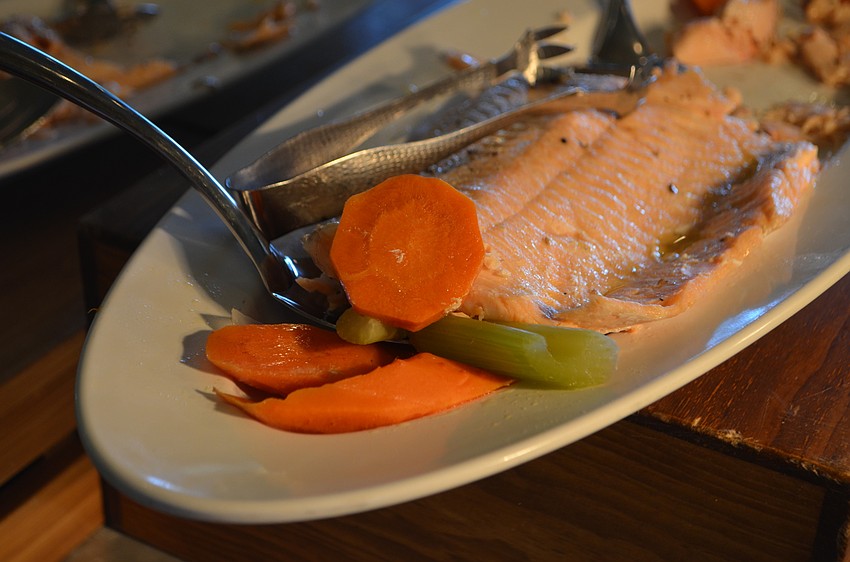 Cold-poached salmon was one of two entrees available. The other was herb roasted chicken.