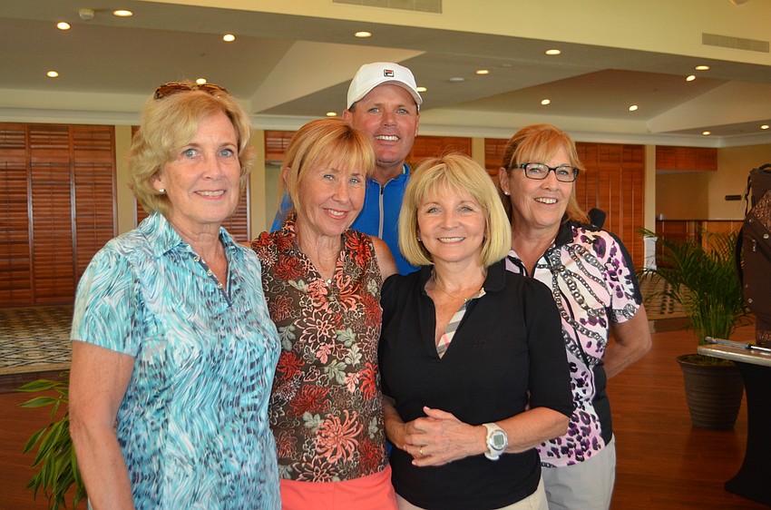 Nancy Shireffs, Linda Rhinelander, Mary Meloche and Michele Kaleida stand with Longboat Key Club Director of Golf, Terry O’Hara. Won first place in the net category with a score of 32.3.