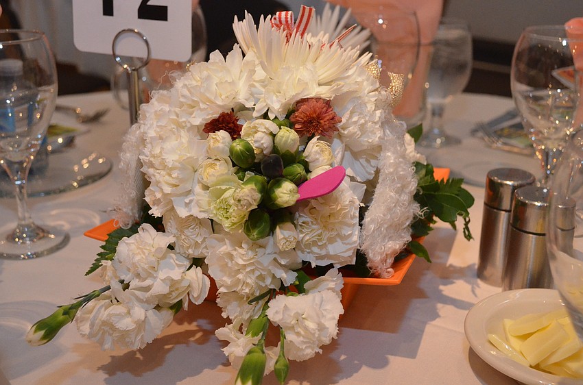 Poodle-shaped centerpieces adorned every table and were also available for purchase through the auction.