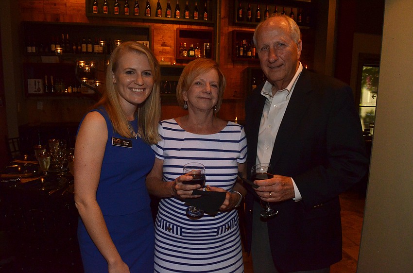 Nicole Eibe, director of donor engagement for the Sarasota Orchestra, with Faith and Bill Reynolds