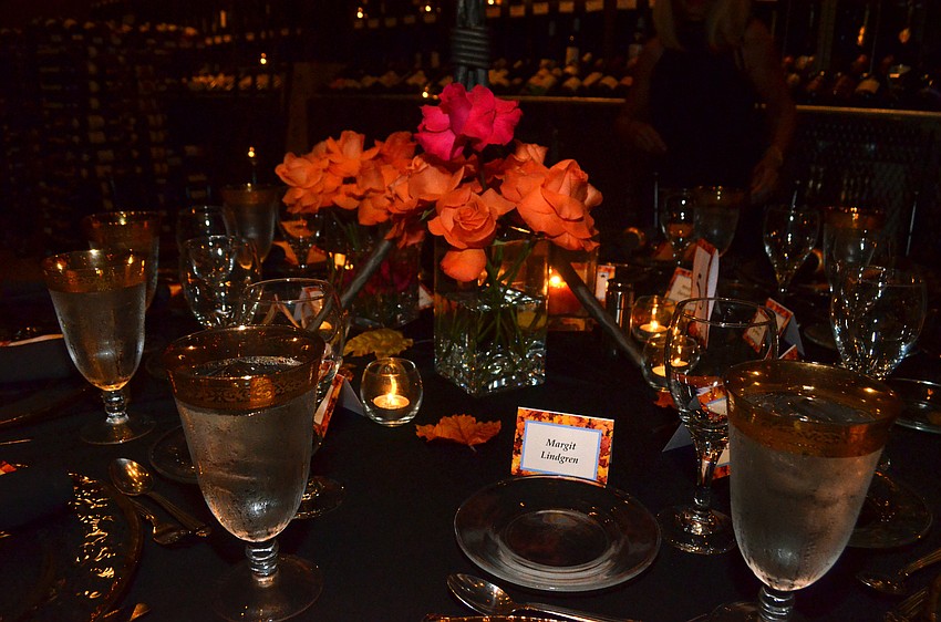 The table settings at Michael’s On East showcase a fall color scheme.