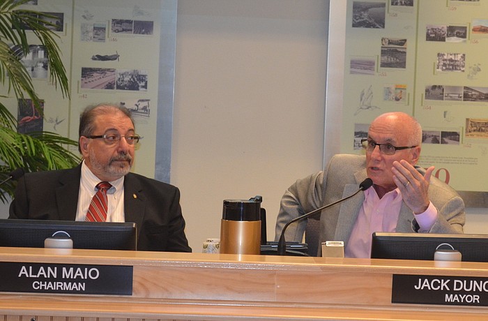 Longboat Key Mayor Jack Duncan, right, and Sarasota County Commissioner Alan Maio sat in on the joint commission meeting focused on solving traffic woes.