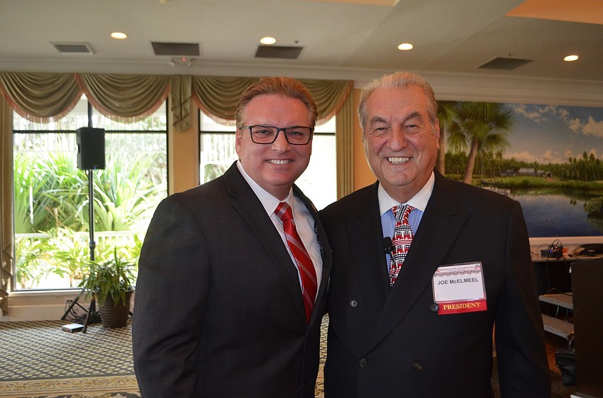 Republican candidate for the District 1 seat on the Sarasota County Commission Mike Moran and club President Joe McElmeel