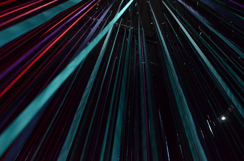 Ribbons suspended from the ceiling of the Keith D. and Linda L. Monda Gallery of Contemporary Art comprise the “Pathless Woods.”