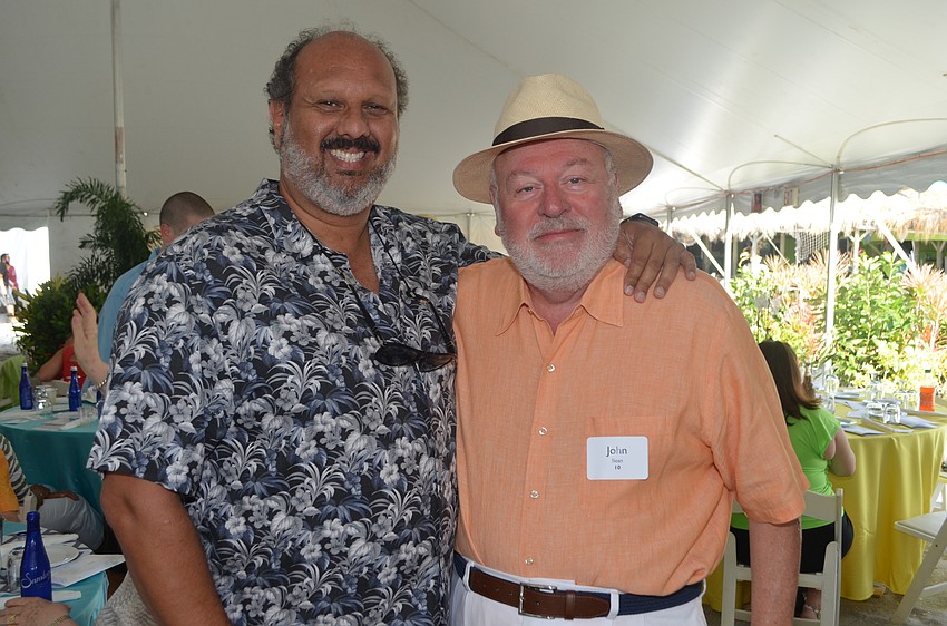 Phillip Tavill, CEO of Children’s First, with John Bean