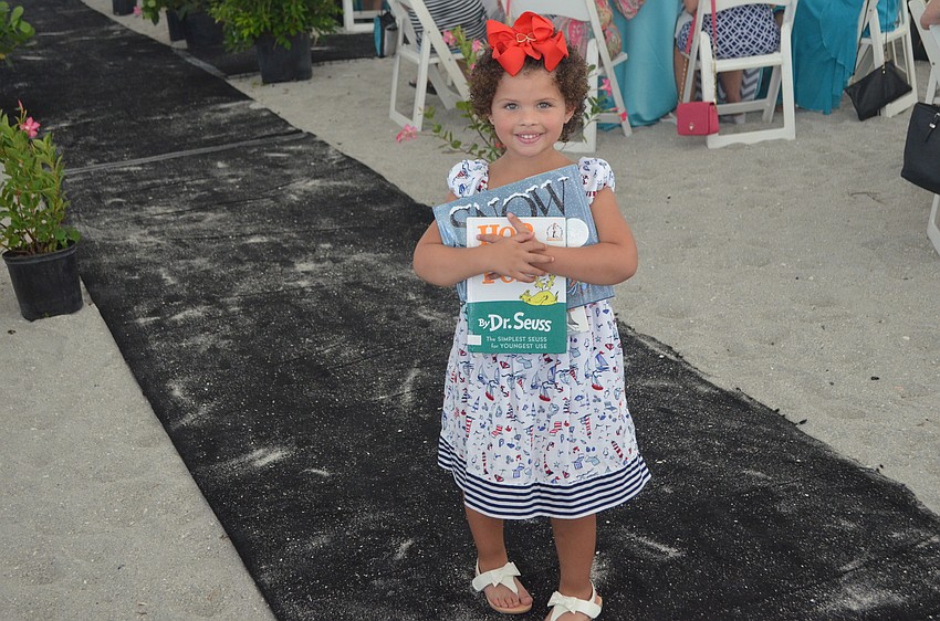 Jazzabelle Morales hits a pose on the runway as the last model of the show.