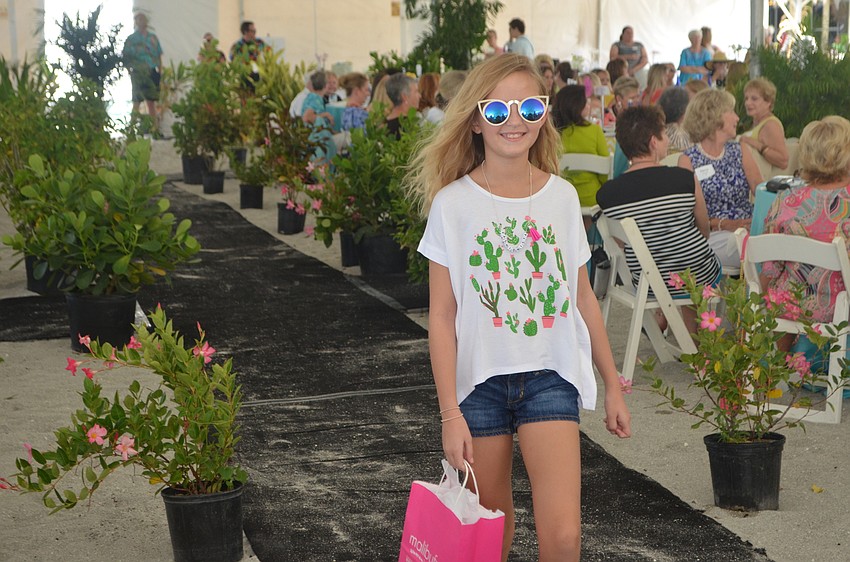 Anna Ourednik walks the runway in an outfit from Malibu Fox.