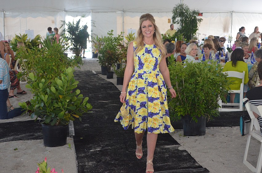 Sarah Horvath walks the runway in a dress from L. Boutique.