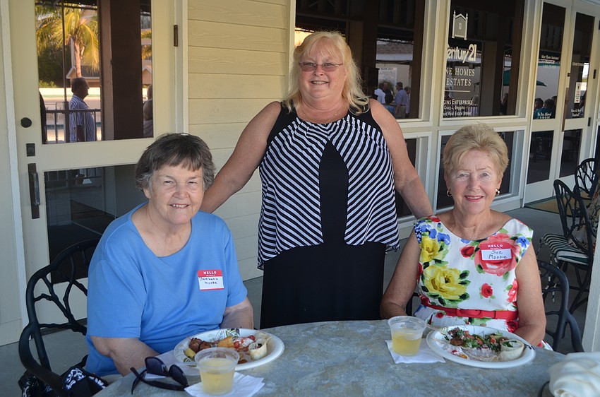 Barbara and Sue Moore with Nancy Dixon (standing)