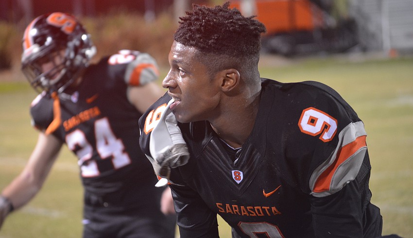 Sarasota sophomore wideout and defensive back Charles Ward chews his receiving glove on the sideline during his team's 42-24 loss to Riverview on Nov. 4.