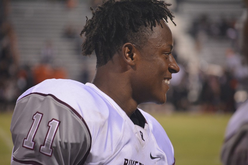Riverview sophomore wide receiver Zy Grable smiles and dances with teammates after the Rams' 42-24 win over rival Sarasota on Nov. 4.
