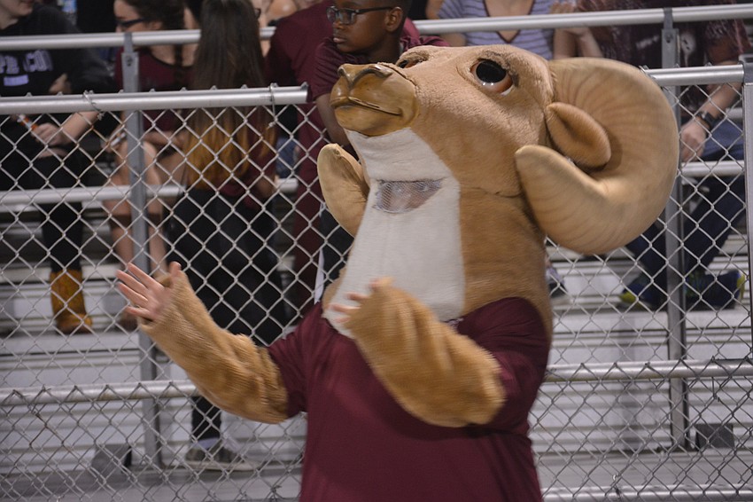 The Rams' mascot prepares to catch a football thrown by a ball boy when Riverview played Sarasota on Nov. 11. The mascot did not catch the ball.