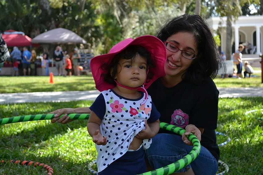 Aliya Kagalwala and Mehnaz Juna try hula hooping.