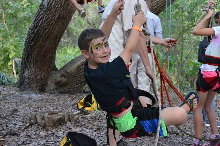 Charles Rock starts his climb up.