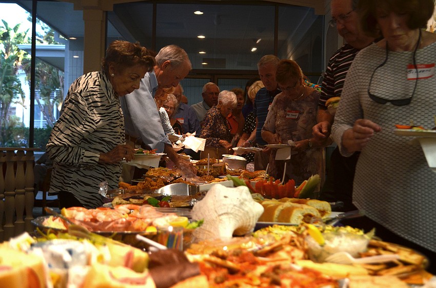 Party-goers brought dishes to share with fellow Longboat Harbour residents.