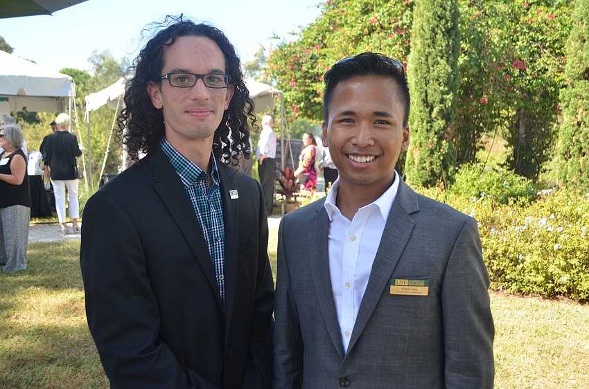 James Kendall, graphic designer for USF, with Angelo Jasa, communications and marketing coordinator for USF