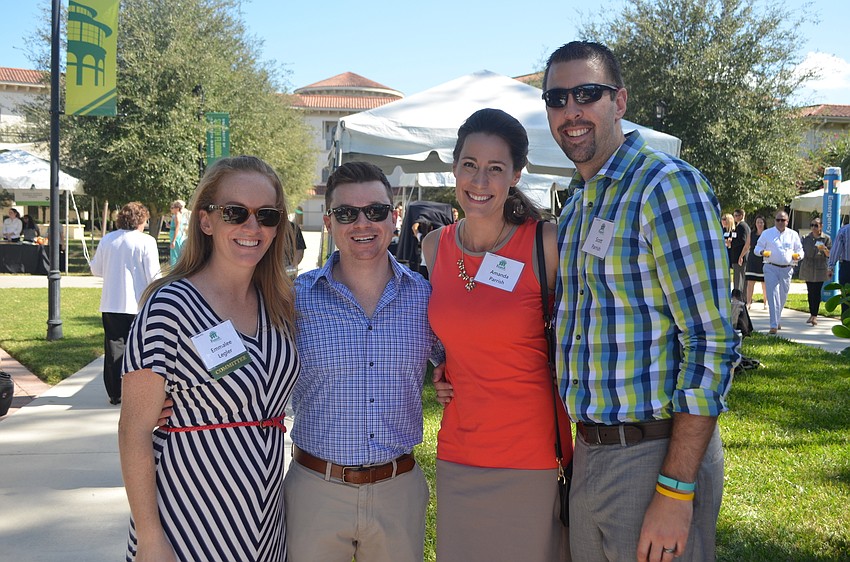 Emmalee and Kennedy Legler with Amanda and Scott Parrish
