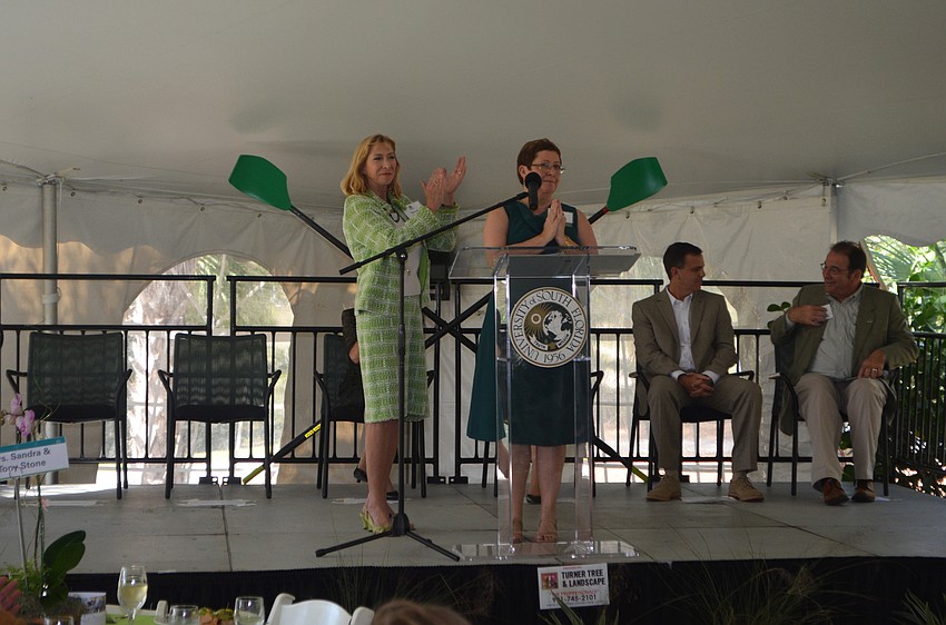 Co-Chairwomen Michelle Crabtree and Amanda Horne applaud USF supporters.