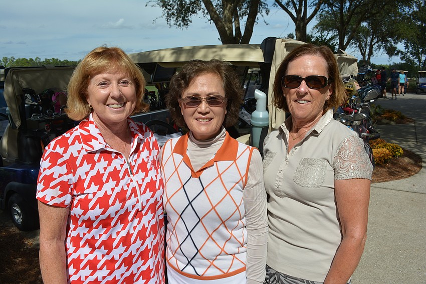 Debbie Reese, Kim Seidman and Carol Hancock of Lakewood Ranch are prepared to head for the first tee.