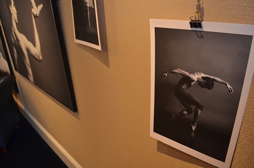 Barbara Banks photography is displayed on the walls of the Bird Key Yacht Club lobby.