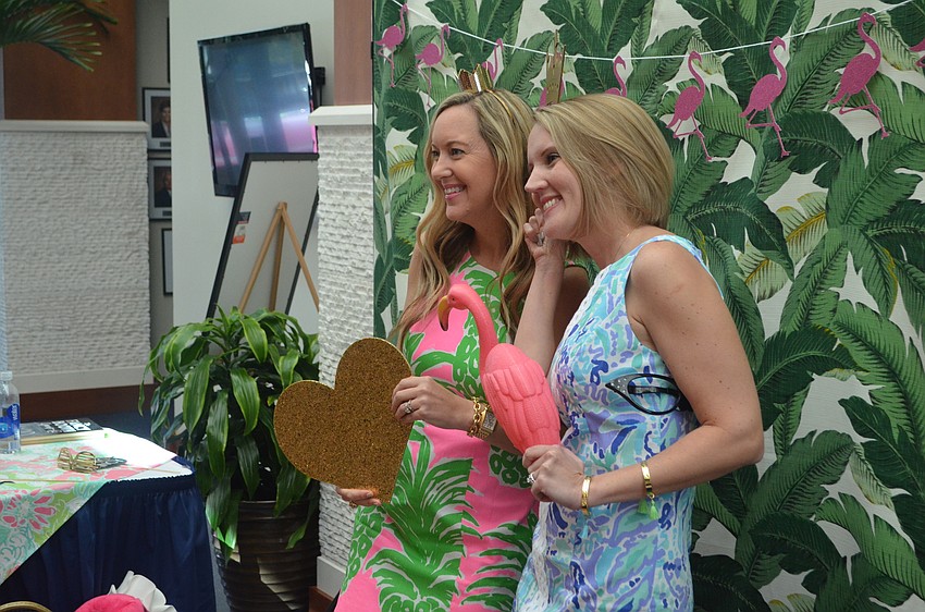 Brigid Saah and Jessica Hays pose in the photobooth.