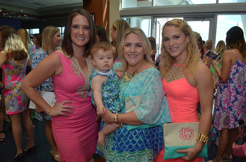 Jen Rust, Erin Christy (holding Maren Craddock), and Jessica Chase