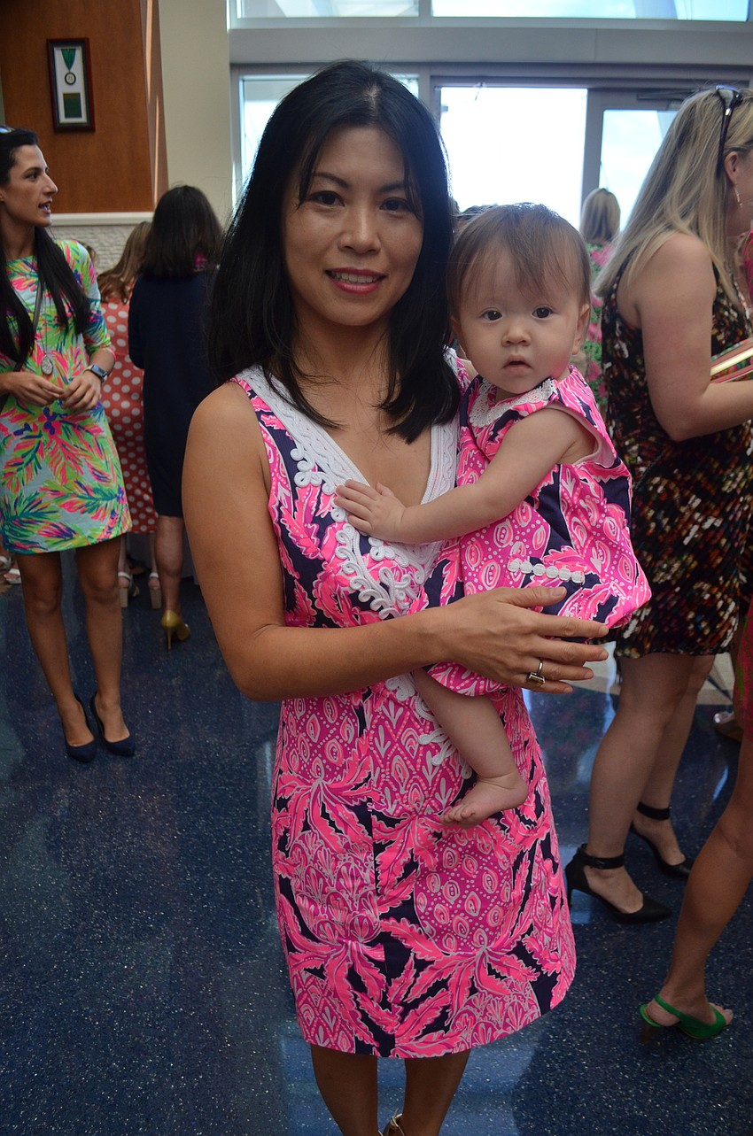 Chisako Spergl holds Sophia Spergl.