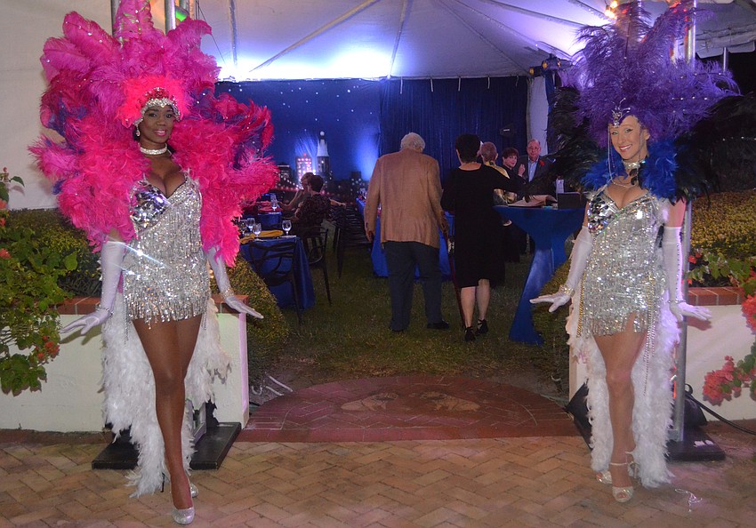 Showgirls promoting the “Guys and Dolls” theme welcoming guests to the dining area.