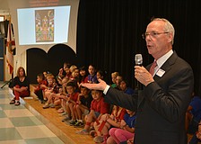 Pat Neal congratulates the students on their effort.