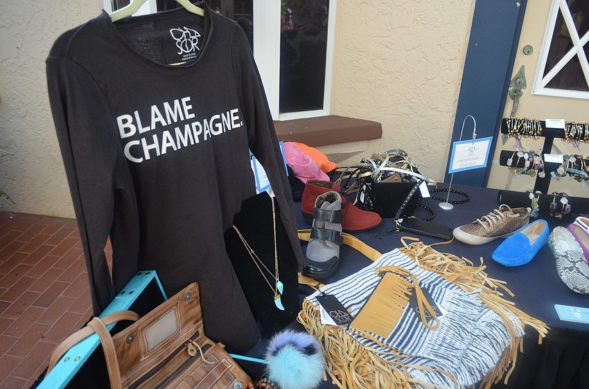 Various items from T.Georgiano's Boutique were for sale during the shopping portion of the event.