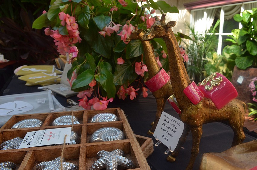 A magnetic giraffe jewelry holder and various other items from The Very Thing were on sale during the shopping portion of the event.