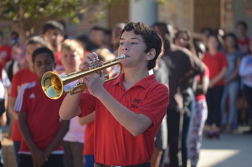 Braden River Middle School eighth-grader Will King plays the trumpet to conclude the Veterans Day service.