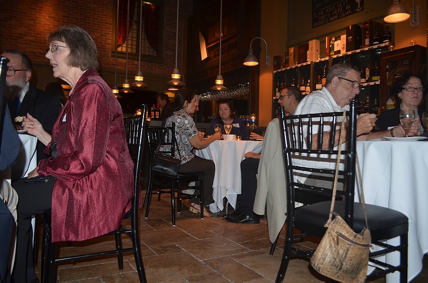 Community members gathered in the Michaels Tasting Room to celebrate CONA's 55th anniversary.