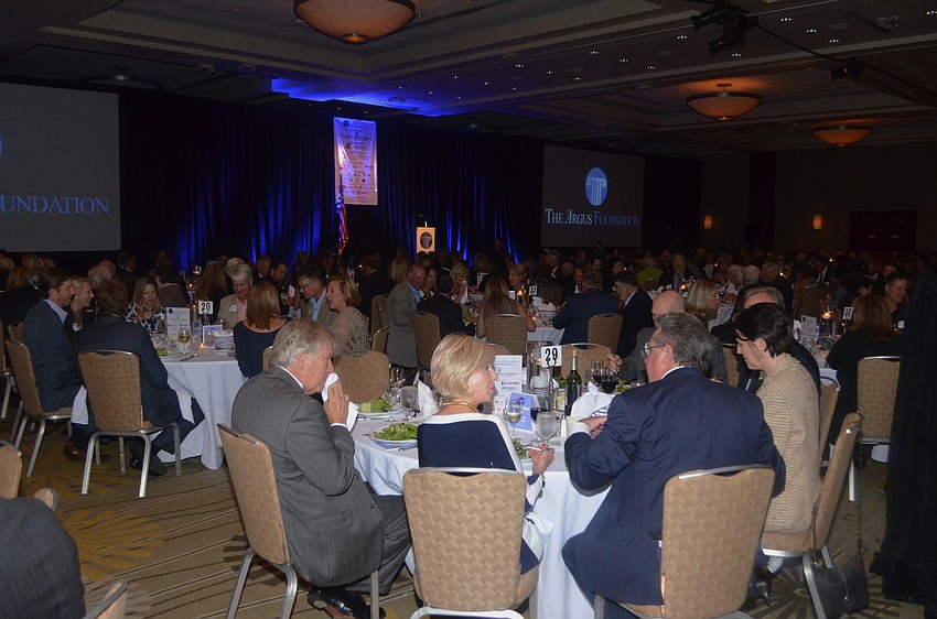 Attendees enjoy dinner in the ballroom of the Hyatt Regency Sarasota.