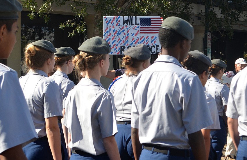 Keith Wilson holds a sign that reads 