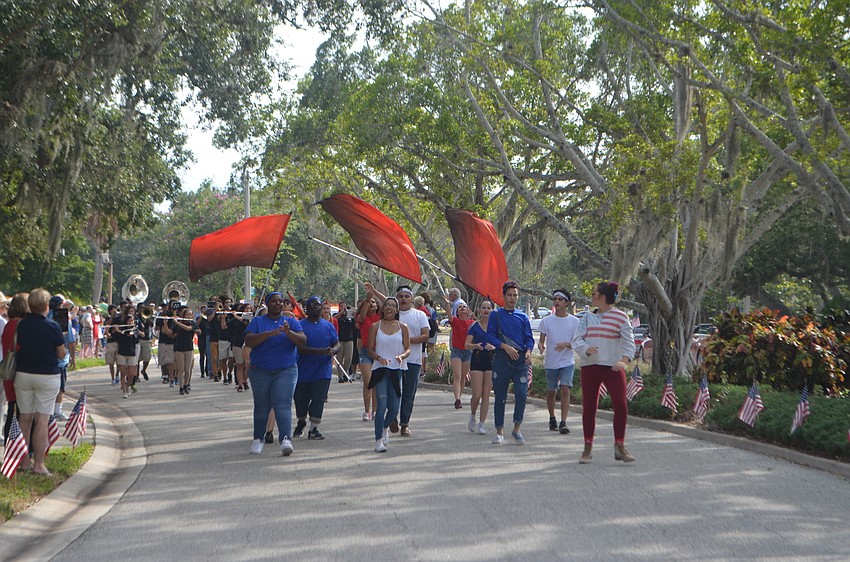 The Booker High School Marching Band, the Whirlwind Brigade, performed during the third annual Longboat Key Veterans Day Parade.