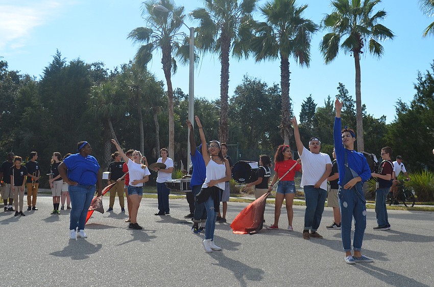 Booker High School Marching Band, The Whirlwind Brigade, and performers entertained the crowd at the end of the parade.