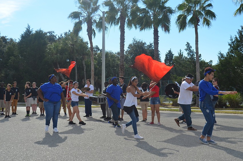 Booker High School Marching Band, The Whirlwind Brigade, and performers entertained the crowd at the end of the parade.