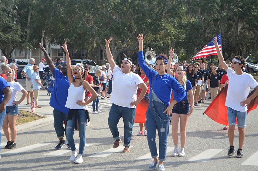 The Booker High School Marching Band, The Whirlwind Brigade, performed during the third annual Longboat Key Veterans Day Parade.