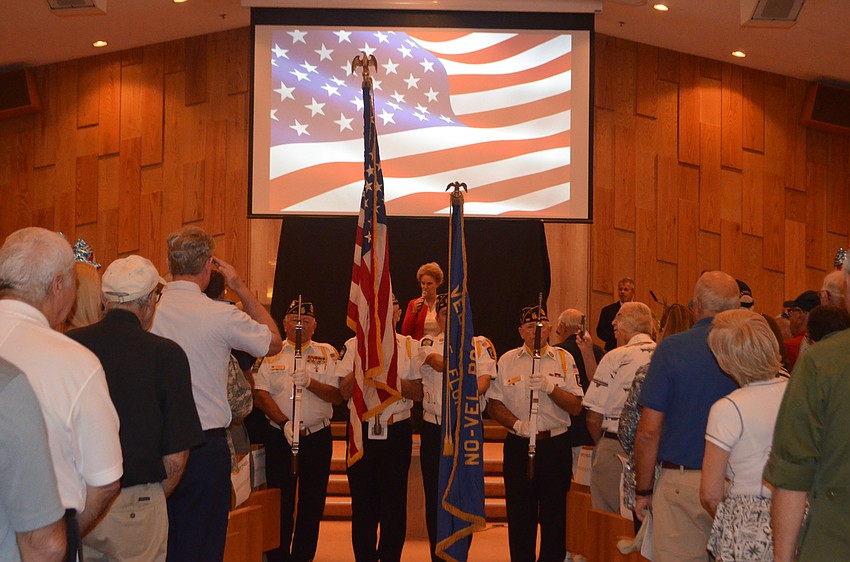 The Color Guard begins the honor program during the Longboat Key Rotary Club’s Veterans Day Parade and Honor Program.